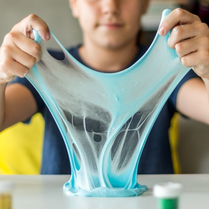 Child playing with slime