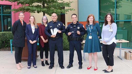 Photo of Fresno Police Chief Paco Balderrama and staff from Valley Children's Injury Prevention Prog