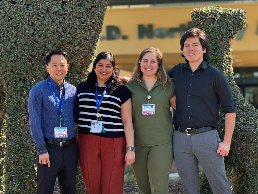 Photo of Valley Children's 2024-2025 chief residents smiling in front of Valley Children's Hospital front entrance