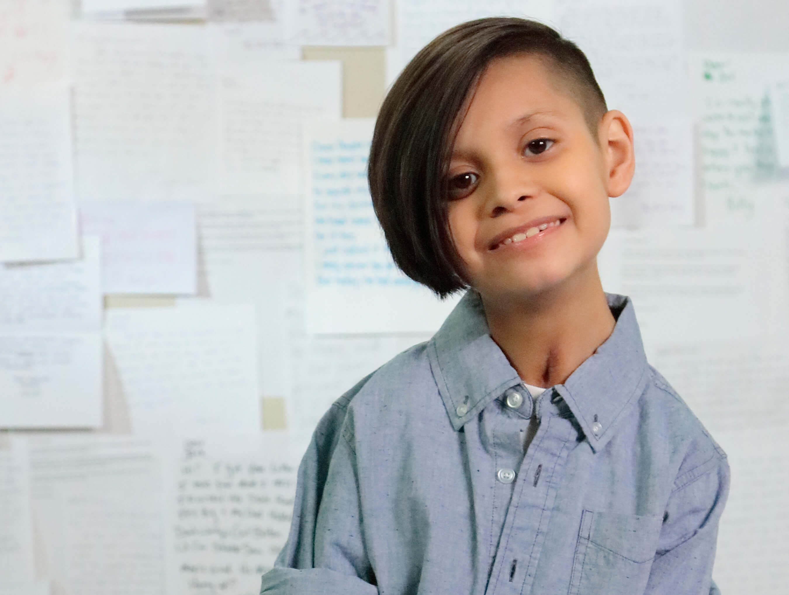 A young boy smiling